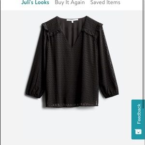 Black ruffled blouse